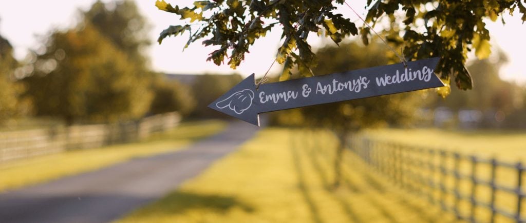 A still from wedding video with A sign to wedding at Mythe Barn