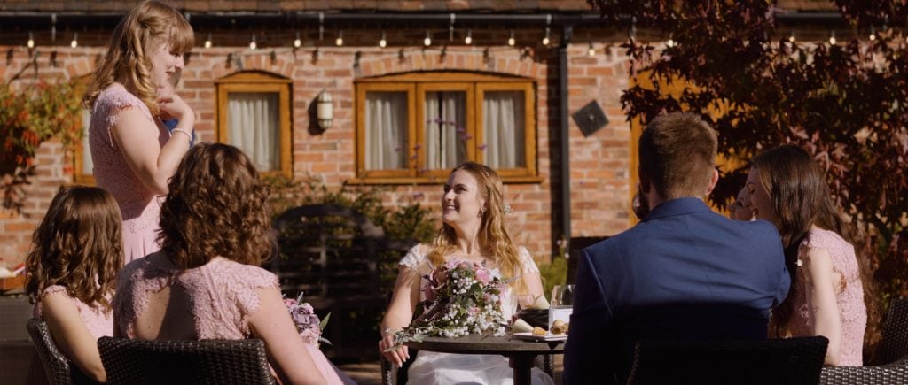 A still from wedding video withBride with bridesmaids at the Mythe Barn